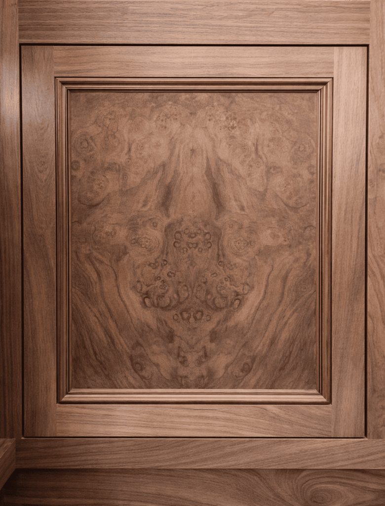 walnut cabinet door with bookmatched walnut bur panel
